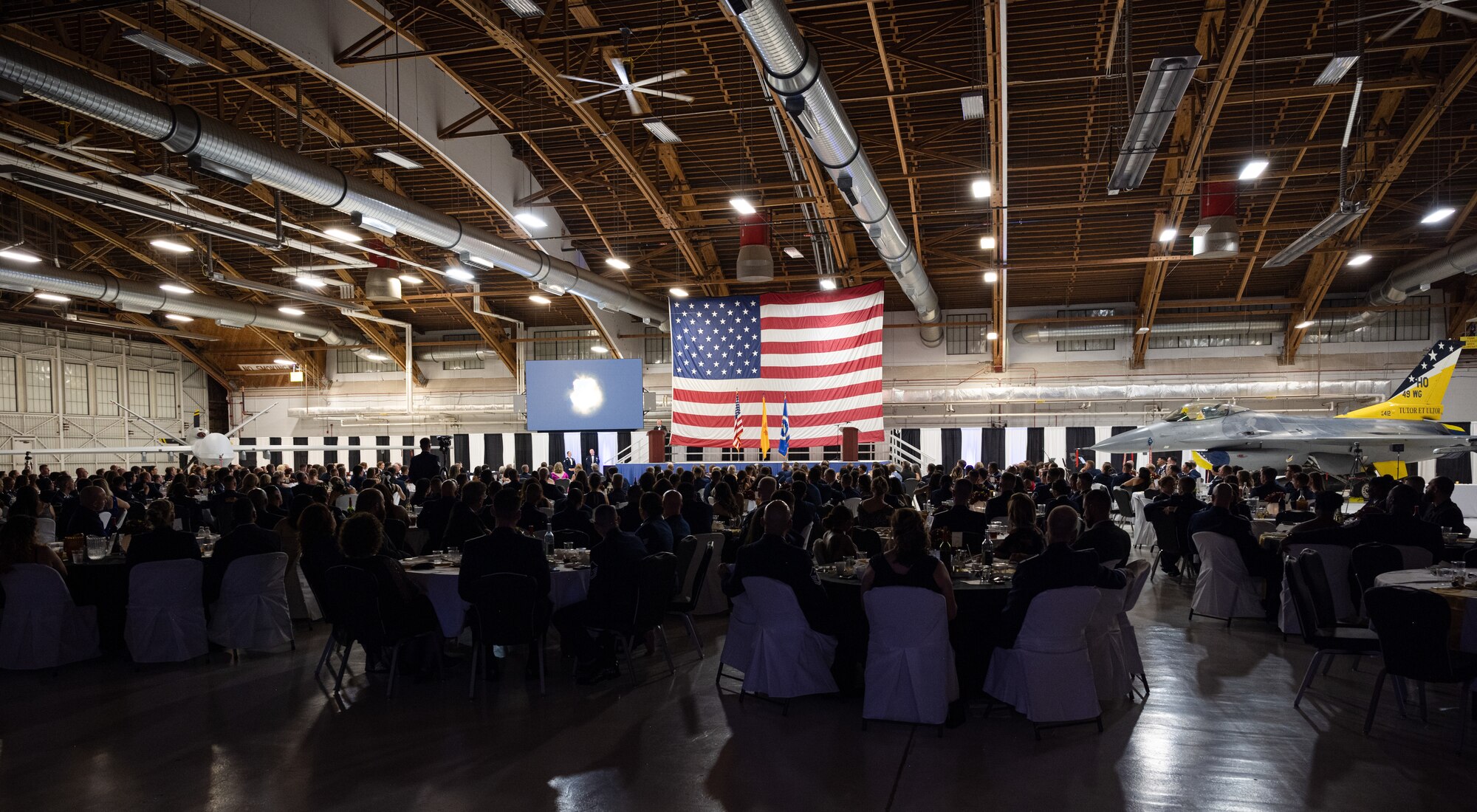 Members of the 49th Wing celebrate during the 2023 Holloman Air Force Ball at Holloman Air Force Base, New Mexico, Sept. 23, 2023. The Air Force Ball is a biennial event held at Air Force bases around the globe, bringing service members and their loved ones together to celebrate the service’s legacy. (U.S. Air Force photo by Senior Airman Antonio Salfran)