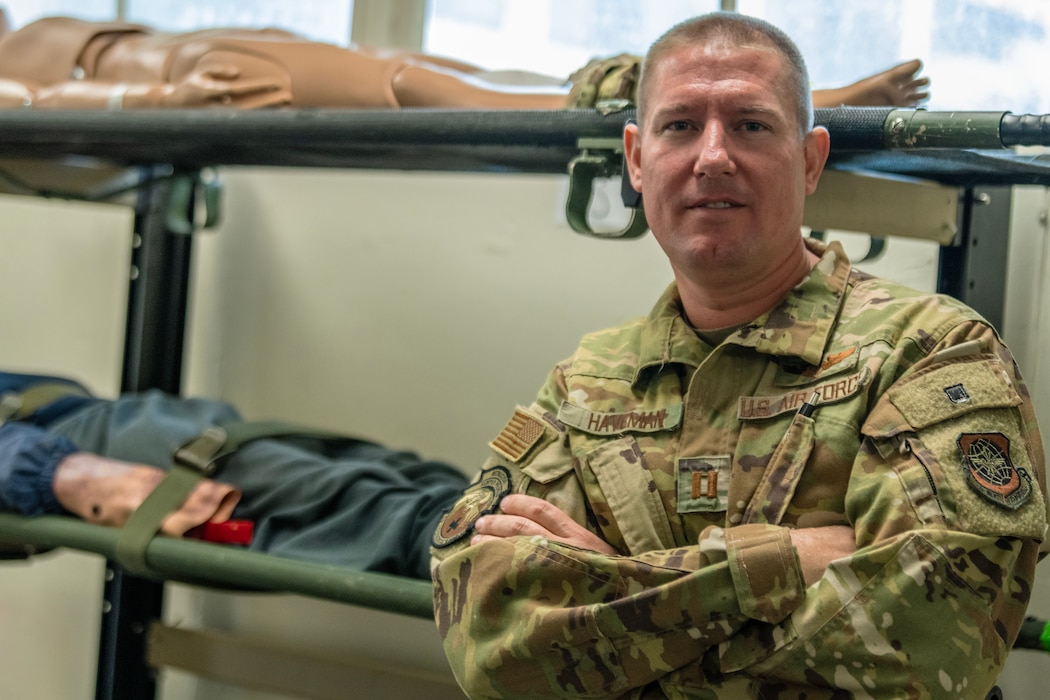 man stands with medical training equipment