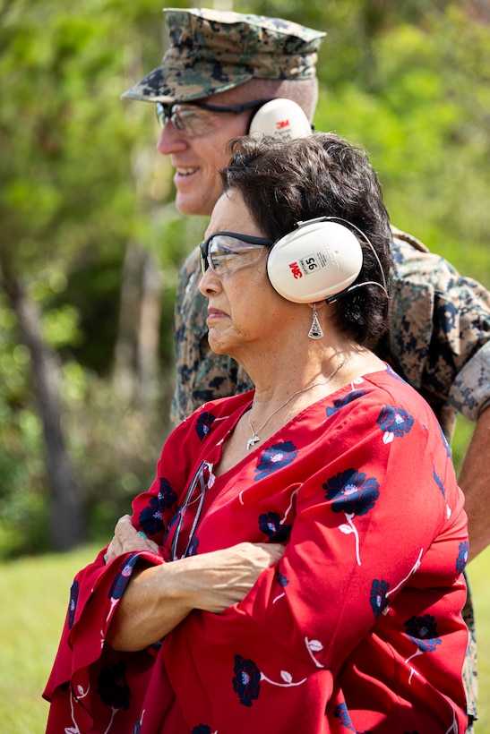 The Honorable Gov. Lourdes Leon Guerrero, front, the governor of Guam, and U.S. Marine Corps Maj. Gen. Stephen Liszewski, back, the commanding general of Marine Corps Installations Pacific, observe a short-bay range on Camp Hansen, Okinawa, Japan, Sep. 15, 2023. The Honorable Gov. Lourdes Leon Guerrero visited Marine Corps Base Camp Butler to speak with key leaders and tour various facilities that included a short-bay range, the Camp Hansen USO, base housing, U.S. Naval Hospital Okinawa, child development centers, and others. (U.S. Marine Corps photo by Cpl. Alex Fairchild)