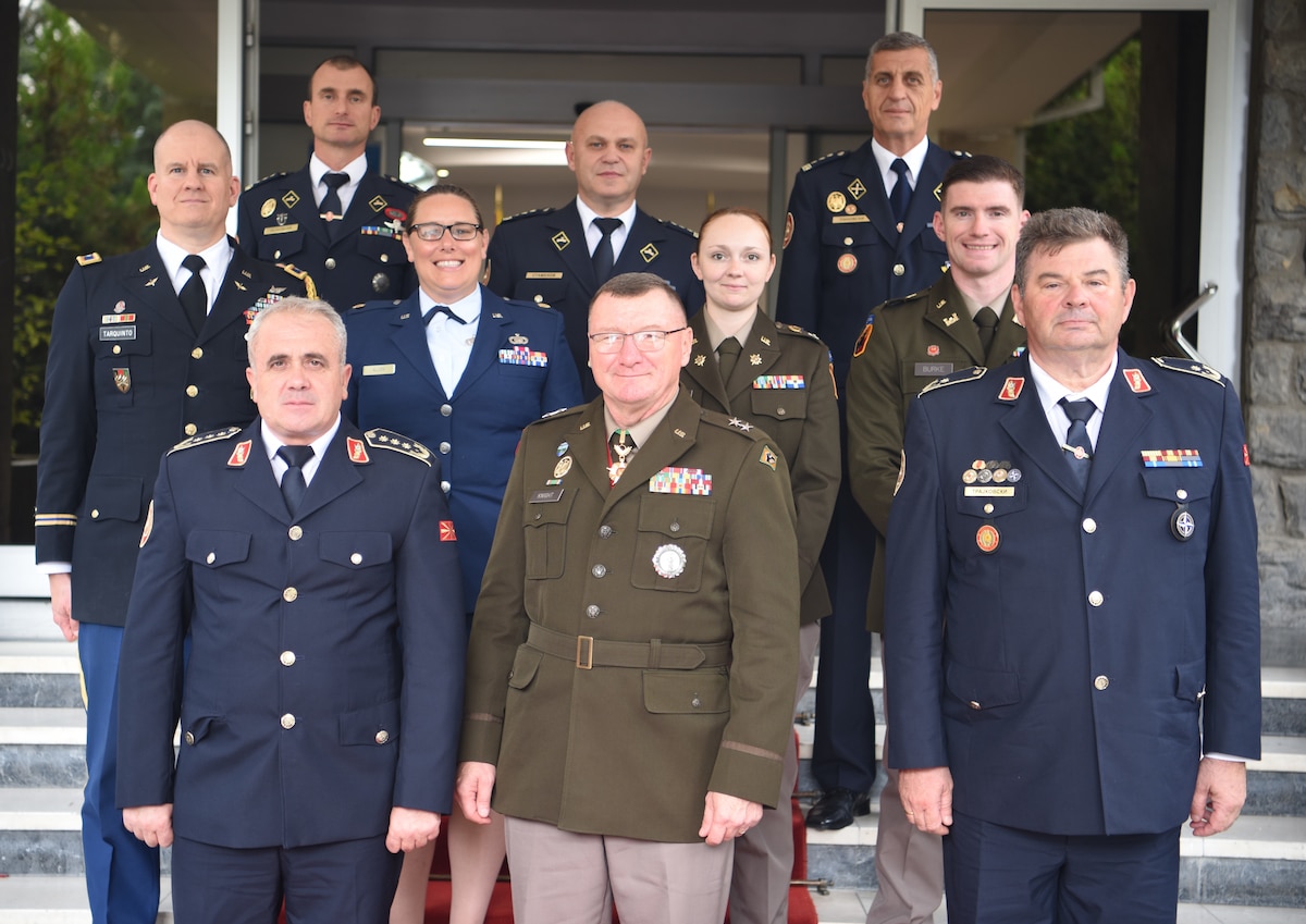 U.S. Army Maj. Gen. Greg Knight, adjutant general, Vermont National Guard, and North Macedonia Lt. Gen. Vasko Gjurchinovski, chief of the general staff, Army of the Republic of North Macedonia, pose with Vermont and North Macedonia delegates outside the Ministry of Defense in Skopje, North Macedonia, Sept. 25, 2023.