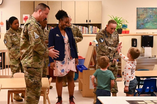  Leadership talks to kids at the child development center