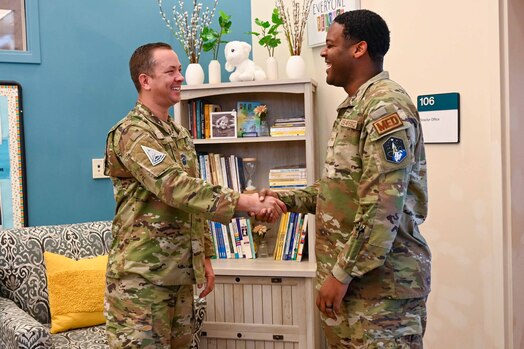  CMSgt Lloyd shakes hands with SrA Berry