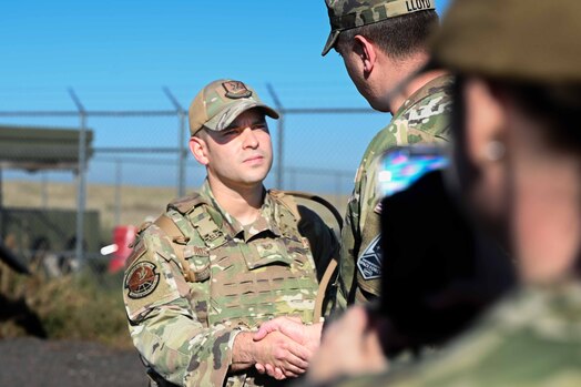  CMSgt Lloyd shakes hands with TSgt Rosario