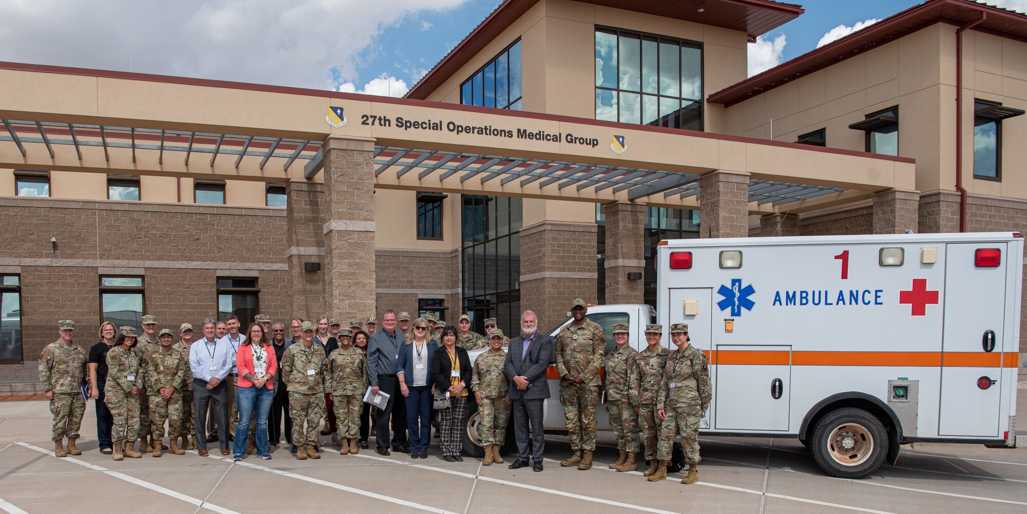Participants of the Medical Support Summit pose for a photo outside the 27th Special Operations Medical Group clinic