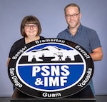 Jacquelynne Rase, operations and budget supervisor, Shop 31, Inside Machine Shop, and Chris McKay, planner analyst, Code 130, Quality Assurance, serve as the new PSNS & IMF SOUND ERG co-chairs. (U.S. Navy photo by Jeb Fach)