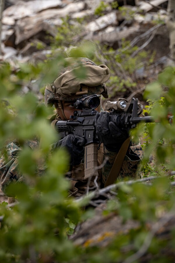 U.S. Marines with Golf Company, 2nd Battalion, 23d Marine Regiment, 4th Marine Division, repel enemy assault during the final exercise of Mountain Training Exercise 4-23 at Marine Corps Mountain Warfare Training Center, Bridgeport, California, June 22, 2023. Marines undergo a 72 hour evaluation testing them in Tactics, Techniques and Procedures for mountain warfare. (U.S Marine Corps photo by Lance Cpl. Samwel Tabancay)