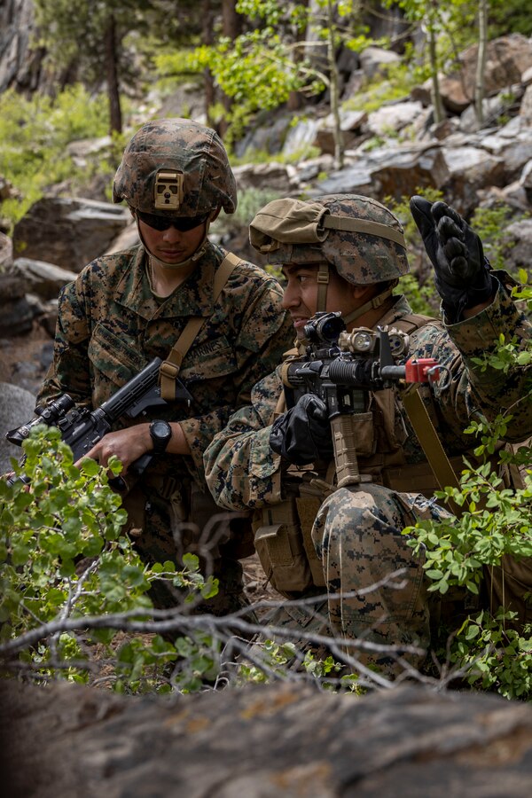 U.S. Marines with Golf Company, 2nd Battalion, 23d Marine Regiment, 4th Marine Division, repel enemy assault during the final exercise of Mountain Training Exercise 4-23 at Marine Corps Mountain Warfare Training Center, Bridgeport, California, June 22, 2023. Marines undergo a 72 hour evaluation testing them in Tactics, Techniques and Procedures for mountain warfare. (U.S Marine Corps photo by Lance Cpl. Samwel Tabancay)