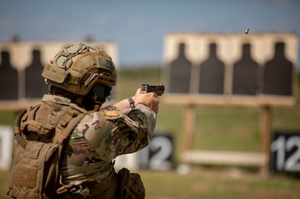 Capt. Erik Mortenson, commander of A Troop, 1st Squadron, 180th Cavalry Regiment, 45th Infantry Brigade Combat Team, Oklahoma Army National Guard, fires at silhouette targets with his M17 pistol during the Sergeant Major’s Match and Governor’s Twenty Marksman Competition at Camp Gruber Training Center, Oklahoma, Sept. 14, 2023. The Sergeant Major’s Match and Governor’s Twenty bring together Soldiers from across the state and tests their weapons skills to earn the coveted Governor’s Twenty tab. (Oklahoma National Guard photo by Spc. Tyler Brahic).