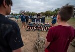 Boy Scouts watch as TACP students practice communication skills in their radio lab classroom.