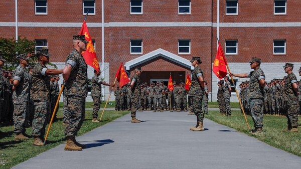 U.S. Marines with 2d Battalion, 8th Marine Regiment, 2d Marine Division stand in formation during an award ceremony on Camp Lejeune, North Carolina, September 15, 2023. U.S. Navy HM3 Clay Campbell, a field medical technician with 2d Battalion, 8th Marine Regiment, 2d Marine Division, was awarded and recognized for providing medical care to a young woman having a seizure until medics arrived on scene, ultimately saving her life. (U.S. Marine Corps photo by Cpl. Megan Ozaki)