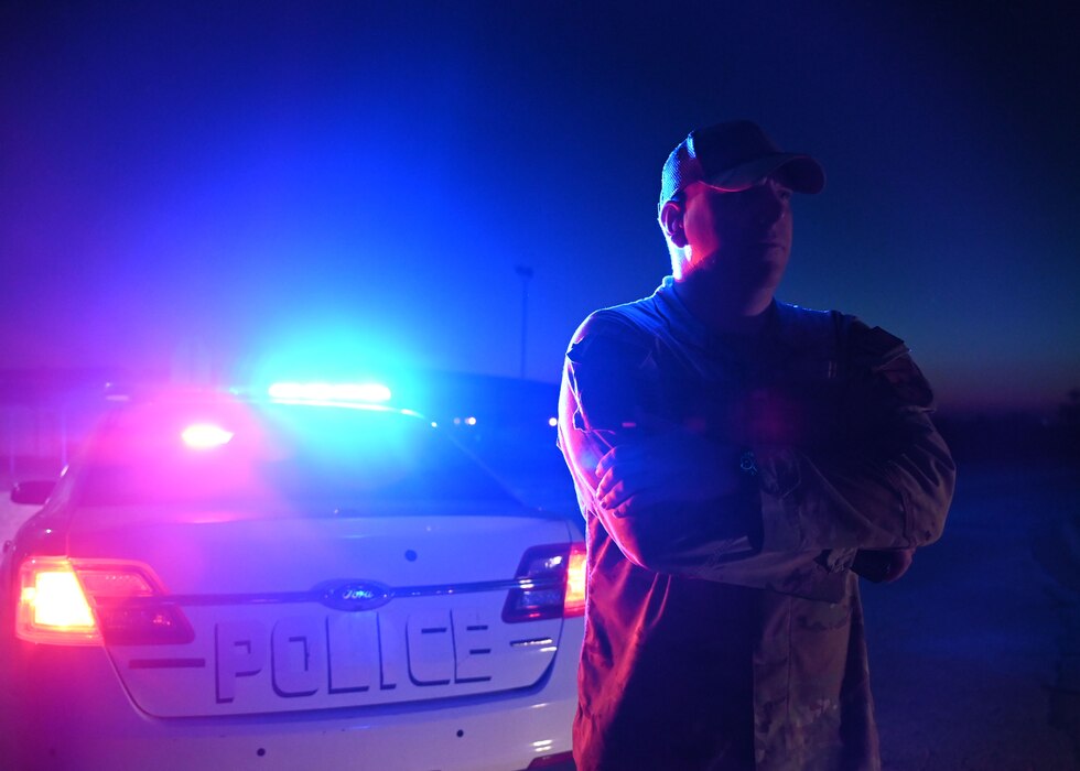 U.S. Air Force Master Sgt. Aaron January, 17th Security Forces Squadron operations superintendent, directs participants during the Jacobson Memorial Ruck at Goodfellow Air Force Base, Texas, Sept. 28, 2023. Members rucked from the 17th SFS’s building to the Jacobson Gate and passed Jacobson’s memorial on the way to the finish line. (U.S. Air Force photo by Senior Airman Sarah Williams)