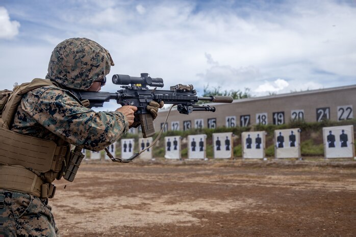 U.S. Marine Corps Cpl. Antonio Keifner, a rifleman with Bravo Company, 3rd Littoral Combat Team, 3rd Marine Littoral Regiment, 3rd Marine Division, fires a suppressed M27 Infantry Automatic Rifle during a range acoustic test at Pu'uloa Range Training Facility, Marine Corps Base Hawaii, Sept. 19, 2023. MCBH's Safety Department and PRTF personnel conducted the acoustic test to record and determine the effectiveness of suppressed weapons at reducing noise pollution exiting PRTF. (U.S. Marine Corps photo by Lance Cpl. Hunter J. Jones)
