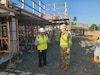 Stephen K. Sullivan, U.S. Army Reserve Chief Financial Officer and Director of Resources, Installations, and Materiel, (left) talks with Command Sgt. Maj. Roderick W. Hendricks, Fort Buchanan Command Sergeant Major, during a visit to observe the military construction taking place at the only U.S. Army installation in the Caribbean.