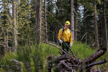 Washington National Guard members train to prepare for wildfire season at the Washington State Department of Natural Resources Interagency Wildland Fire Training Academy near Roy, Wash., April 30, 2023. The training included familiarization with hand tools, line construction and tactics, and fire shelter deployment and entrapment avoidance.