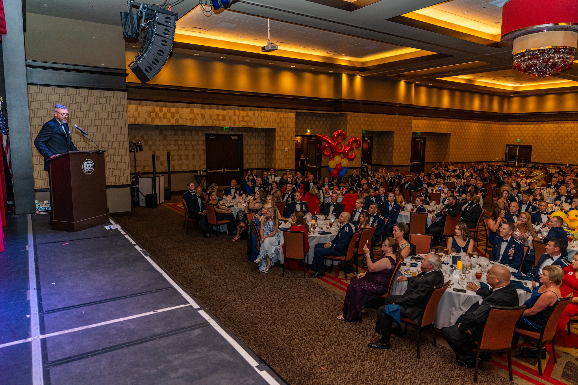 Retired U.S. Air Force Chief Master Sgt. Don Gurganus, guest speaker, gives his speech during the 2023 Air Force Ball at the Golden Nugget Casino, Mississippi, Sept. 23, 2023.