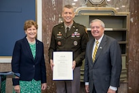 Sen. Jeanne Shaheen and Lindsey Graham, Senate National Guard Caucus co-chairs, present Army Gen. Daniel Hokanson, chief, National Guard Bureau, with a formal copy of Senate Resolution 308 to recognize the historic significance of the 30th anniversary of the founding of the Department of Defense National Guard Bureau State Partnership Program, Dirksen Senate Office Building, Washington, D.C., Sept. 27, 2023. The State Partnership Program was established in 1993 to assist countries emerging from behind the Iron Curtain. It now includes 88 partnerships with 100 nations and the National Guard of every state, territory and the District of Columbia.