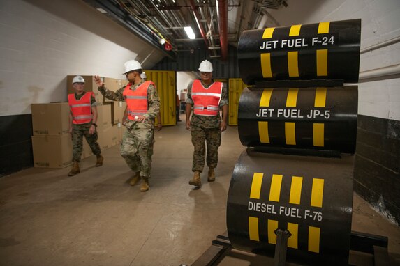 Joint Task Force-Red Hill (JTF-RH) communications directorate personnel transit through Adit 1 while conducting tamper seal checks as a safety measure in preparation for defueling operations on Joint Base Pearl Harbor-Hickam, Hawaii, Sept. 26, 2023. JTF-RH is in phase four of its five-phase defueling plan where personnel are focused on completion of pre-defueling material assessments, continued training and rehearsals, routine maintenance actions, and quality assurance and safety checks. This is the final preparatory stage prior to commencement of gravity defueling on Oct. 16 and marks the final coordination with the Department of Defense, Environmental Protection Agency, and Hawaii Department of Health before approval to defuel is received. (DoD photo by U.S. Navy Mass Communication Specialist 1st Class Jordan KirkJohnson)