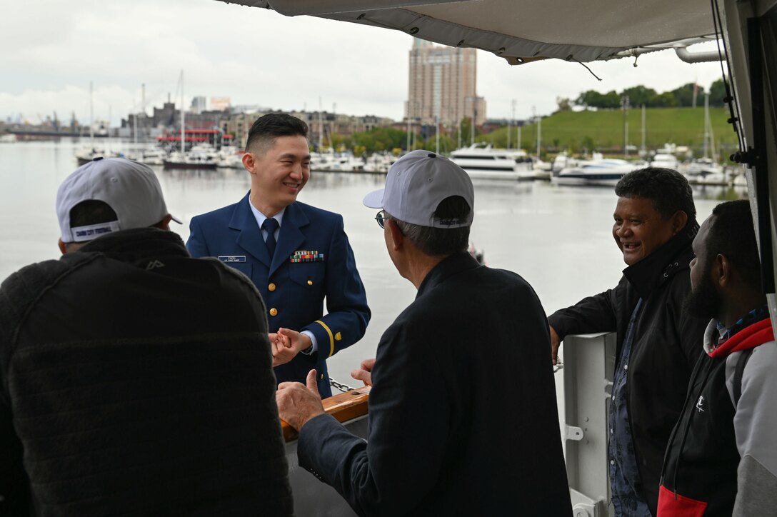 Ensign Richard Park leads a tour of the Coast Guard Cutter Forward (WMEC 911) for several Pacific Island Forum leaders while the cutter was moored in Baltimore, Sept. 24, 2023. The cutter tour was a prelude to the official start of the U.S.- PIF Summit hosted by Commandant of the Coast Guard, Adm. Linda Fagan, and widely attended by Pacific Island leaders. (U.S. Coast Guard photo by Petty Officer 3rd Class Mikaela McGee).