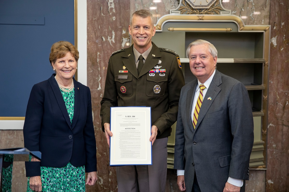 Sen. Jeanne Shaheen and Lindsey Graham, Senate National Guard Caucus co-chairs, present Army Gen. Daniel Hokanson, chief, National Guard Bureau, with a formal copy of Senate Resolution 308 to recognize the historic significance of the 30th anniversary of the founding of the Department of Defense National Guard Bureau State Partnership Program, Dirksen Senate Office Building, Washington, D.C., Sept. 27, 2023. The State Partnership Program was established in 1993 to assist countries emerging from behind the Iron Curtain. It now includes 88 partnerships with 100 nations and the National Guard of every state, territory and the District of Columbia.