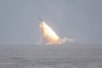 PACIFIC OCEAN (Sept. 28, 2023) - An unarmed Trident II D5LE missile launches from the Ohio-class ballistic missile submarine USS Louisiana (SSBN 743), marking a successful Demonstration and Shakedown Operation-32 (DASO-32) off the coast of San Diego, California, Wednesday. The primary objective of a DASO is to evaluate and demonstrate the readiness of the SSBN's Strategic Weapon System (SWS) and crew before operational deployment following the submarine's engineered refueling overhaul. DASO-32 is the last DASO conducted by an Ohio-class SSBN coming out of engineering refueling overhaul (ERO), marking the completion of all post-ERO DASOs for the Ohio-class SSBNs. The Trident II D5LE strategic weapon system is the system that will provide the initial SWS capability for the Columbia-class SSBN. (U.S. Navy Photo by Mass Communication Specialist 3rd Class Kevin Tang)