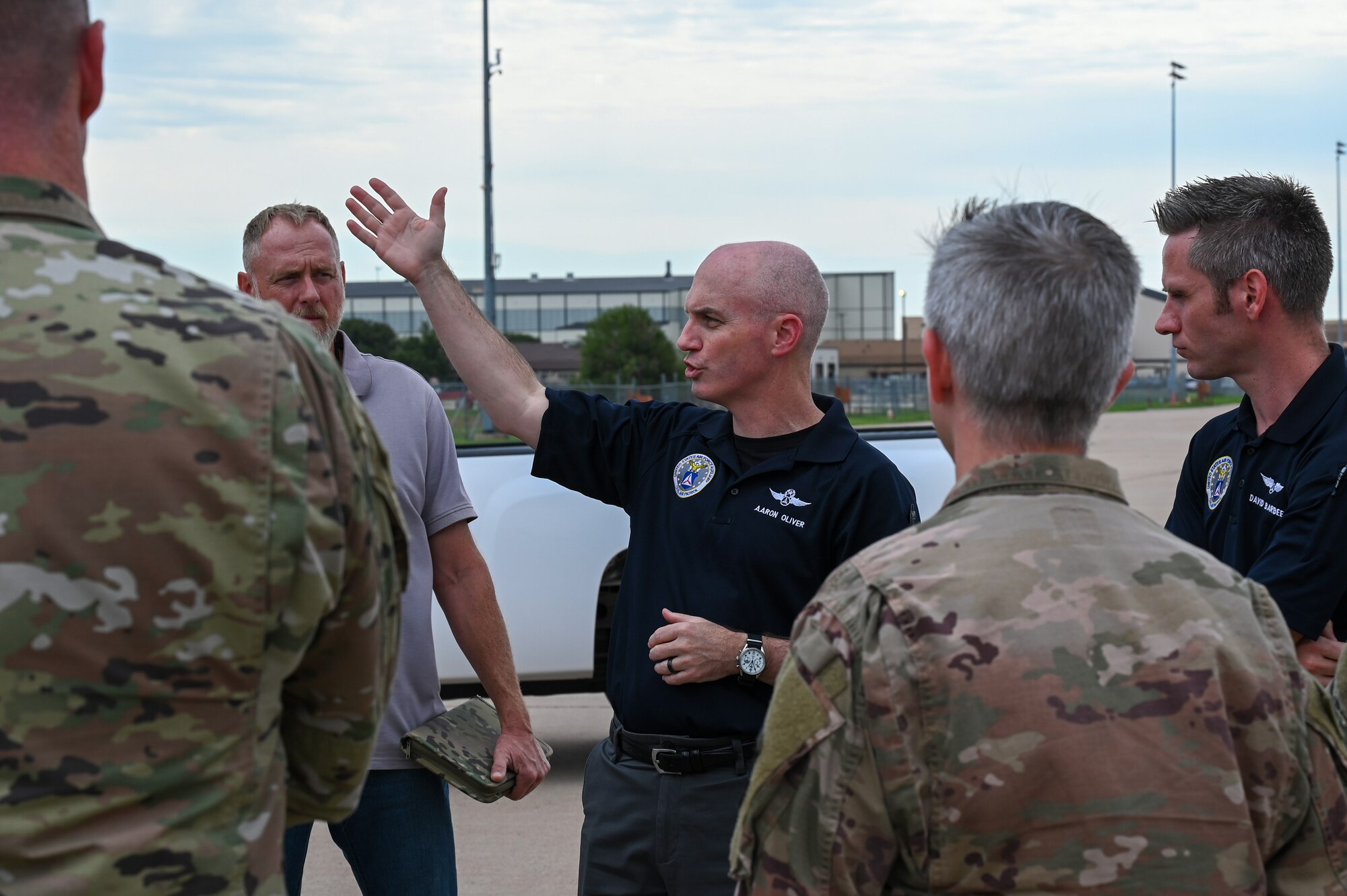 Col. Aaron Oliver, Oklahoma Wing Civil Air Patrol commander, talks about the logistics behind the delivery to attendees at Dyess Air Force Base, Texas, Sept. 21, 2023. This achievement highlights the dedication and innovative spirit of both civilian and military aviation entities, while also enhancing civil-military partnerships and highlighting an emerging capability within CAP as the Air Force Auxiliary. (U.S. Air Force photo by Senior Airman Sophia Robello)