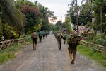 U.S. Marines with Marine Rotational Force – Darwin, Australian Army Soldiers, and Philippine Marines conduct a combined assault during Exercise Alon at Palawan, Philippines, Aug. 22, 2023.  Exercise Alon, part of Indo-Pacific Endeavor 2023, is a bilateral amphibious training activity between the Australian Defence Force and the Armed Forces of the Philippines, supported by MRF-D.  The exercise focused on enhancing interoperability and readiness to respond to shared security challenges. (U.S. Marine Corps photo by Maj. Matthew Wolf)