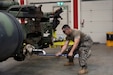 U.S. Army Sgt. Joseph Farnsworth, senior wheeled vehicle mechanic with the 175th Support Maintenance Company, 377th Theater Sustainment Command, torques the equalizer beam bolts on a heavy expanded mobility tactical truck during Operation Forward Wrench at Maintenance Activity Kaiserslautern in Kaiserslautern, Germany, Sept. 18, 2023. Farnsworth participated in Operation Forward Wrench as a part of the 175th SMC’s annual training, which is a time for U.S. Army Reserve Soldiers to hone their skills and technical proficiencies. (U.S. Army Reserve photo by Sgt. Logan Swift)