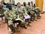 Male Soldier taking hearing test.