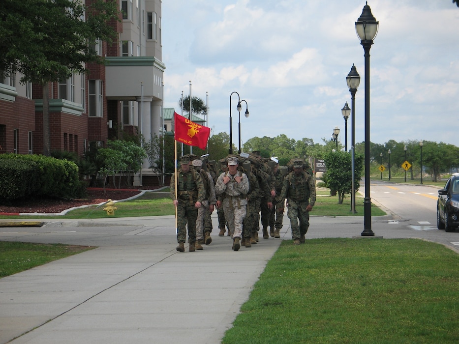 Lt. Col. Russell Mantzel, MATSG-42 executive officer, and Gunnery Sgt. Corey Johnson, group gunnery sergeant, lead their Marines through NAS Pensacola to the Leadership Reaction Course at NAS Pensacola, March 31-April 1, 2012.