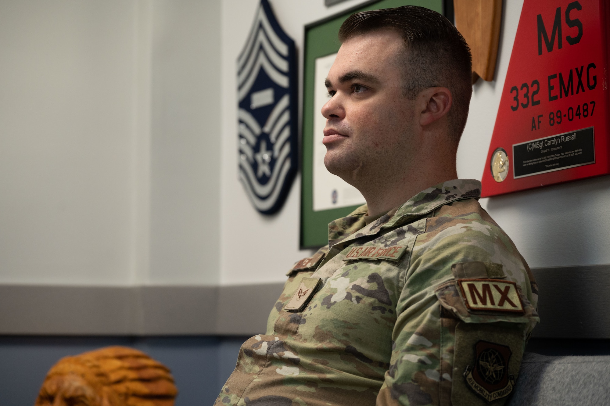 Senior Airman Clay Osler, 436th Maintenance Squadron C-5M Super Galaxy crew chief, listens to Chief Master Sgt. Carolyn Russell, 436th Airlift Wing command chief, during a leadership shadow opportunity at Dover Air Force Base, Delaware, Sept. 27, 2023. The purpose of the leadership opportunity was to give junior enlisted Airmen a look into the world of their senior leaders.