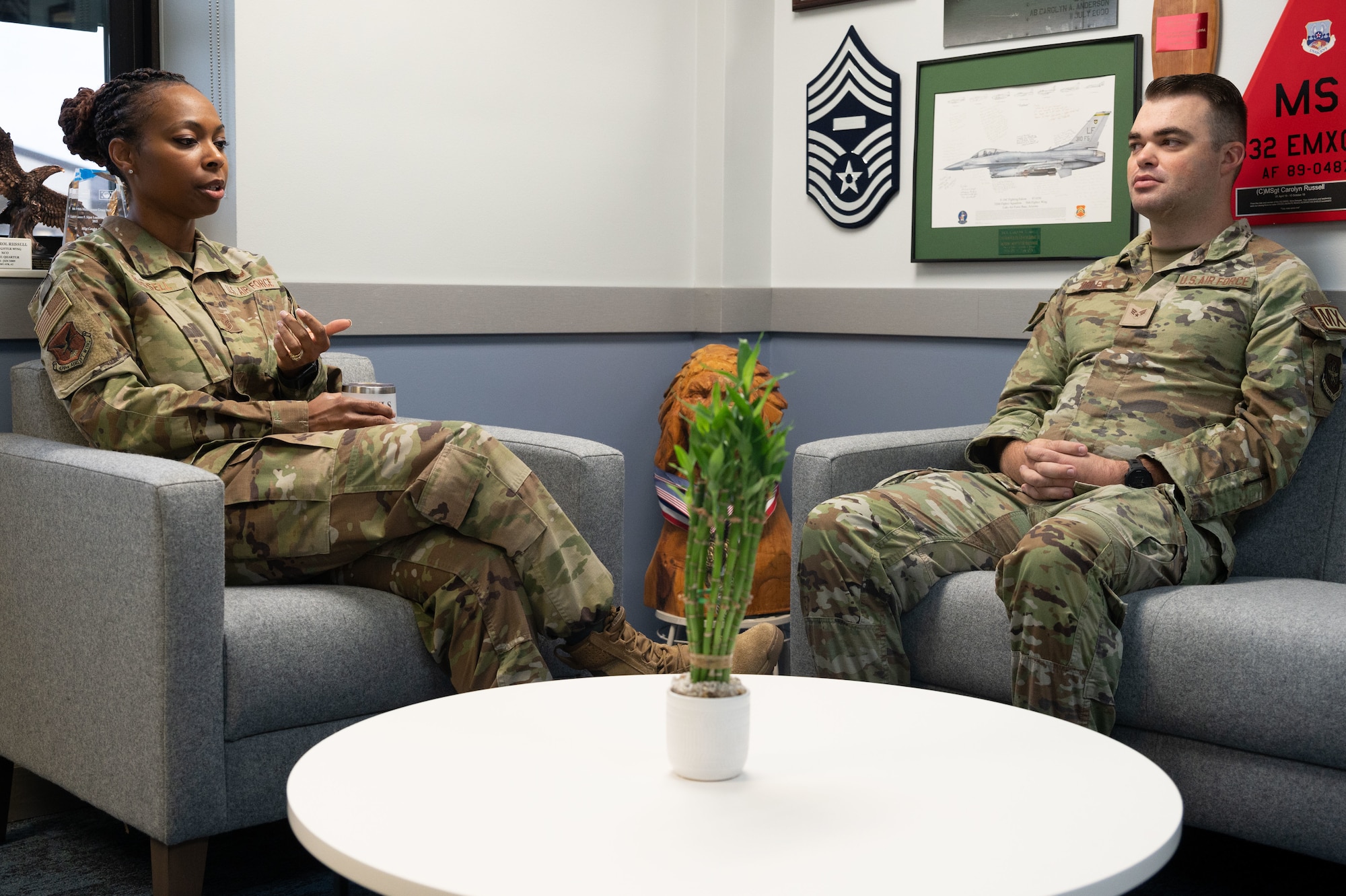Chief Master Sgt. Carolyn Russell, left, 436th Airlift Wing command chief, speaks with Senior Airman Clay Osler, right, 436th Maintenance Squadron C-5M Super Galaxy crew chief, during a leadership shadow opportunity at Dover Air Force Base, Delaware, Sept. 27, 2023. The purpose of the leadership opportunity was to give junior enlisted Airmen a look into the world of their senior leaders.