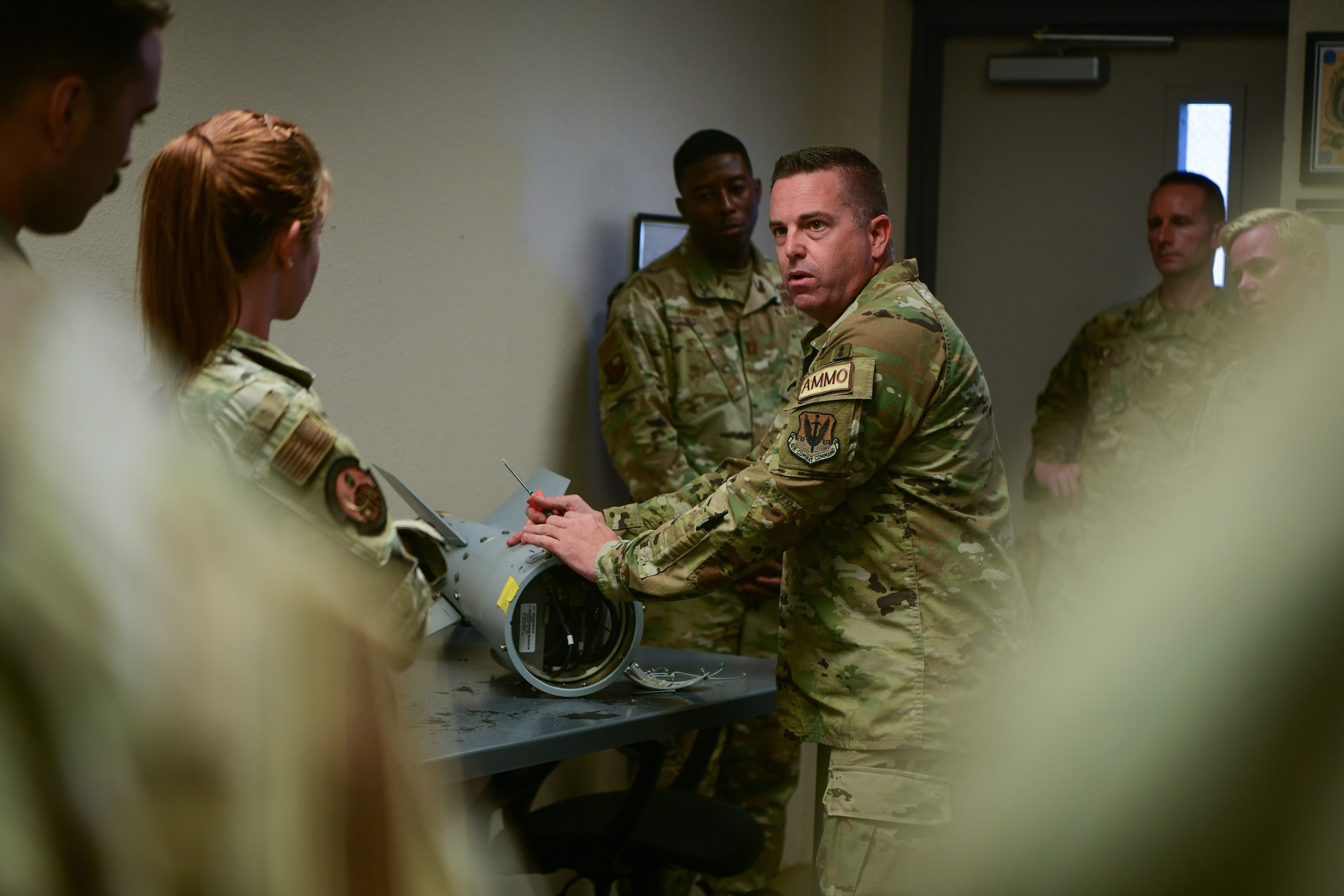 U.S. Air Force Master Sgt. Paul Smith, 9th Munitions Squadron Air Force Combat Ammunition Center combat advisor, gives a demonstration for the senior officer orientation (SOO) course on Beale Air Force Base, California on Sept. 25, 2023.