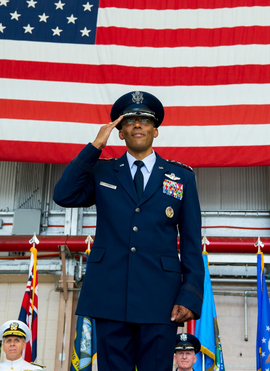 Gen. C.Q. Brown, Jr. gives his his first salute as U.S. Pacific Air Forces commander during an assumption of command ceremony at Joint Base Pearl Harbor-Hickam, Hawaii, July 26, 2018. Brown now leads U.S. Indo-Pacific Command's air component, delivering airpower across 53 percent of the globe. (U.S. Air Force photo by Staff Sgt. Jack Sanders)