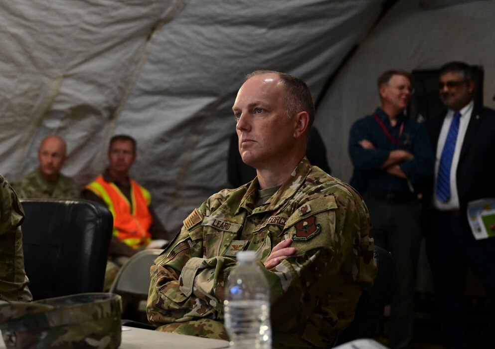 U.S. Air Force Col. Matthew Leard, Air Education Training Command Chief of Staff, receives a brief on the mission and vision of the Joint All Domain Exercise, Forward Operation Readiness Generation Exercise at Goodfellow Air Force Base, Texas, Sept. 28, 2023. JADE FORGE is a simulated joint deployment area which provides a training environment for intelligence, surveillance and reconnaissance capabilities. (U.S. Air Force photo by Airman 1st Class Madison Collier)