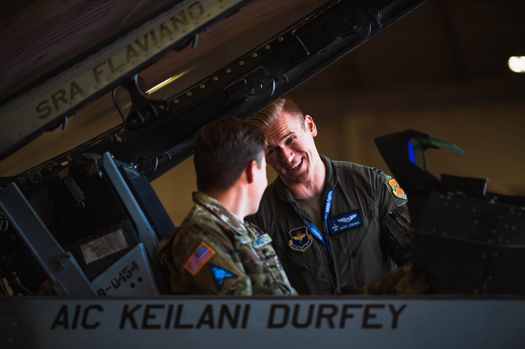 U.S. Air Force Capt. Daniel Friesen, 309th Fighter Squadron instructor pilot, talks to Jacob Bagley, Shadow Mountain High School Space Force Junior ROTC cadet, during the Luke Air Force Base JROTC Career Expo Sept. 29, 2023, at Luke AFB, Arizona.