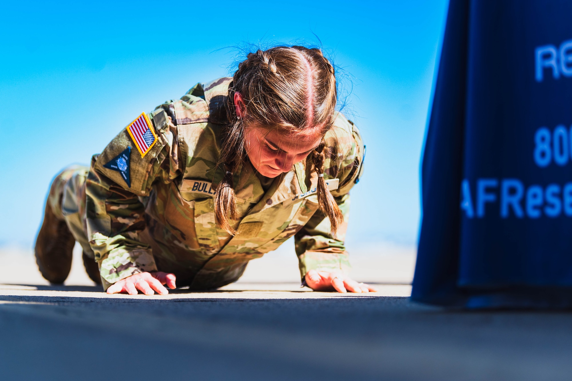 Avery Bullard, Shadow Mountain High School Space Force Junior ROTC cadet, participates in a push up contest during the Luke Air Force Base JROTC Career Expo Sept. 29, 2023, at Luke AFB, Arizona.