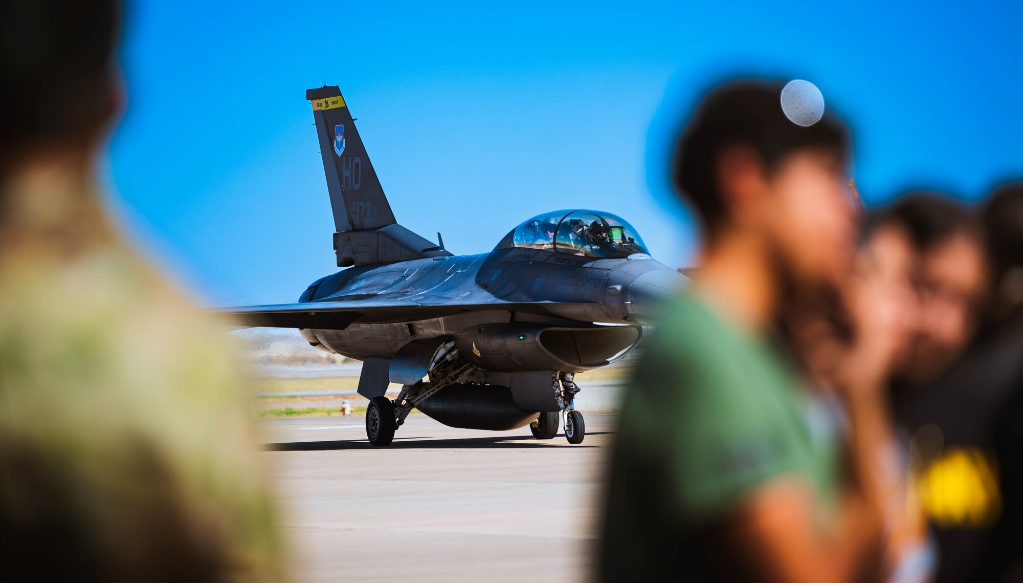 A U.S. Air Force F-16 Fighting Falcon taxies down the flightline during the Luke Air Force Base Junior ROTC Career Expo Sept. 29, 2023, at Luke AFB, Arizona.