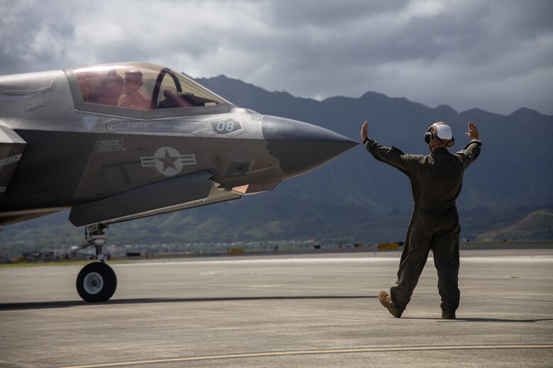 U.S. Marine Corps F-35s with Marine Fighter Attack Squadron 211 (VMFA-211), 3rd Marine Aircraft Wing, prepare to take off during a forward arming and refueling point (FARP) exercise that U.S. Marines with Marine Wing Support Squadron 174 (MWSS-174), Marine Aircraft Group 24, 1st Marine Aircraft Wing, are participating in during Force Design Integration Exercise (FDIE) at Marine Corps Air Station Kaneohe Bay, Hawaii, Sept. 27, 2023. A FARP is used to extend the capabilities of rotary or fixed-wing aircraft to allow rearming and refueling without having to fall back to a forward operating base. (U.S. Marine Corps photo by Lance Cpl. Logan Beeney)