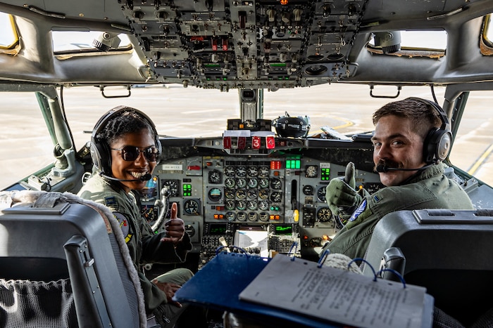 U.S. Air Force Capt. Andrea Coleman and 2nd Lt. Travis Trent, pilots with the 116th Air Control Wing, Georgia Air National Guard, give the thumbs up on an E-8C Joint STARS during its last mission at Ramstein Air Force Base,  Germany, Sept. 21, 2023.