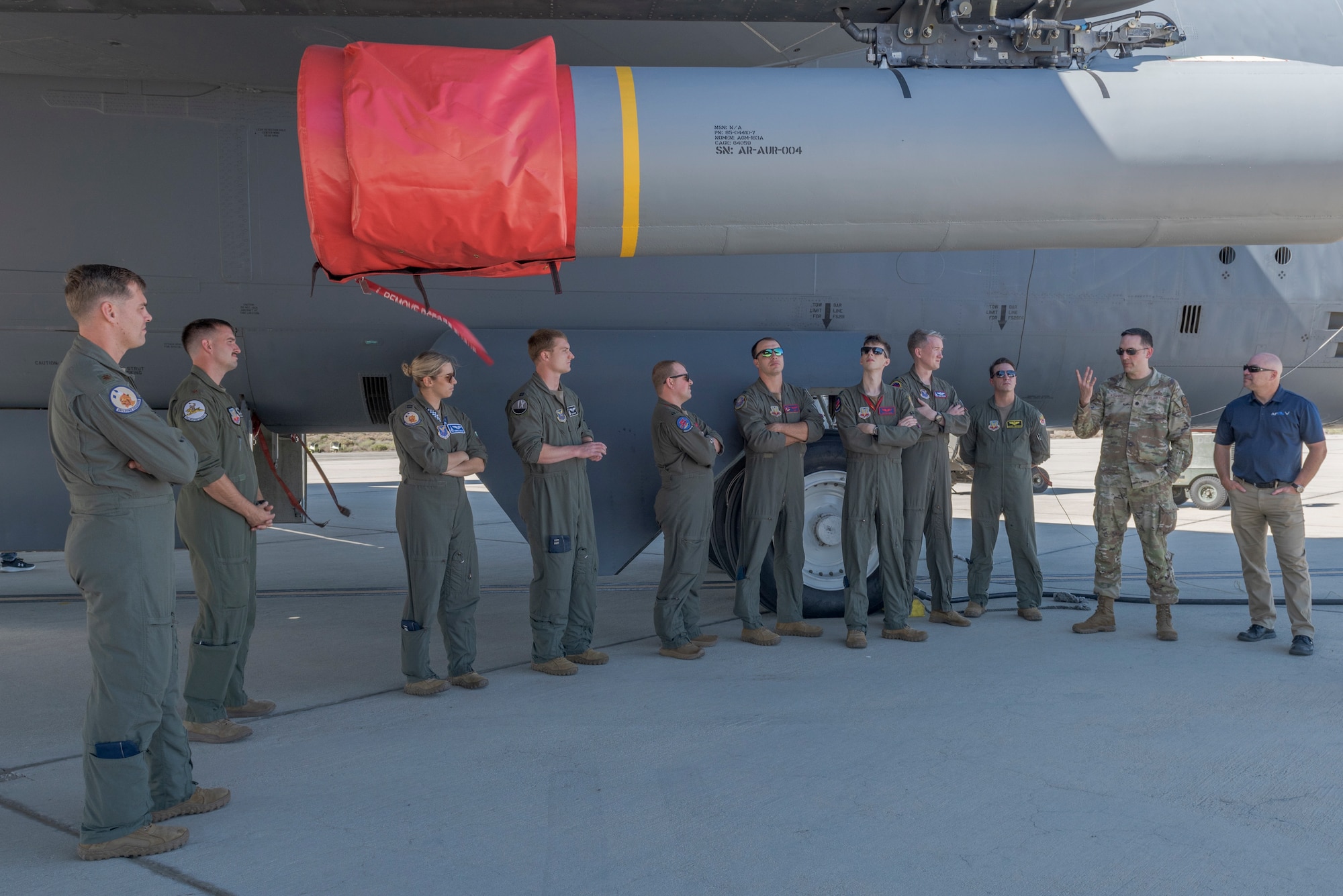 U.S. Air Force Lt. Col. Jeffrey Komives, Hypersonic Employment subject matter expert, orients operational crews B-1 Lancer, B-2 Spirit, B-52 Stratofortress, and F-15E Strike Eagle units across Air Force Global Strike Command and Air Combat Command on the Air Force’s Hypersonic Attack Cruise Missile as they participate in hypersonic weapon familiarization training at Edwards Air Force Base, California, Sept. 28, 2023. The participating crews received expert academics and training on hypersonic fundamentals and participated in tactical discussion on hypersonic operations to increase operational readiness and prepare multiple aircraft communities for hypersonics including the Hypersonic Attack Cruise Missile, Air-launched Rapid Response Weapon, and other programs under development. The Department of Defense is developing hypersonic science and technology to ensure the U.S. can rapidly field operational hypersonic systems. (U.S. Air Force photo by Lindsey Iniguez