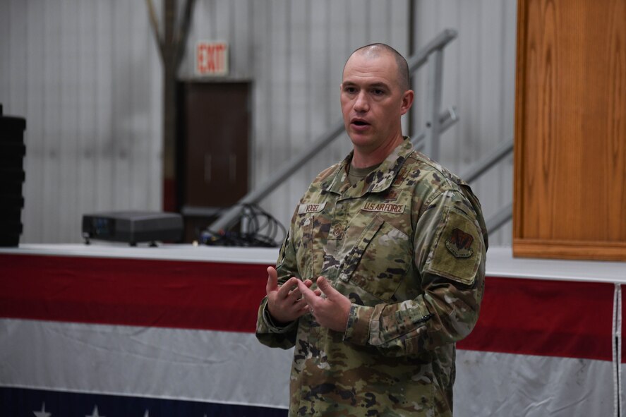 A man in a military uniform is speaking.