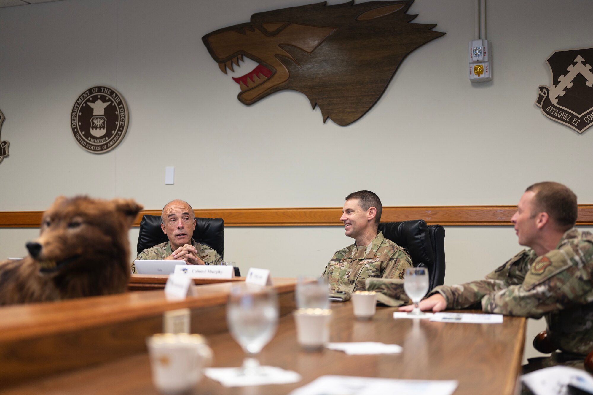 Air Force and Space Force surgeon general, learns about the Wolf Pack’s role in the Indo-Pacific region during a mission brief