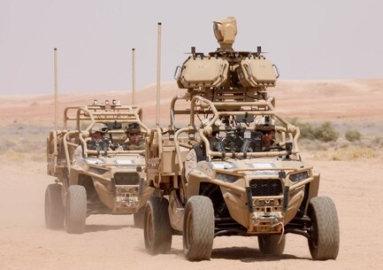 U.S. Marines with 26th Marine Expeditionary Unit, Low Altitude Air Defense (LAAD) Detachment, employ the Light Marine Air Defense Integrated System (LMADIS) during Red Sands 23.2, a counter-unmanned aerial system live fire exercise conducted by the Saudi Arabian Armed Forces and U.S. Army Central at Shamal-2 Range in northeastern Saudi Arabia on Sept. 10, 2023. This is the second iteration of the Red Sands Integrated Experimentation Center (IEC) concept, a forum to test and field counter-UAS systems and implement best practices to optimize interoperability between partners and systems.  (U.S. Army photo by Staff Sgt. Latasha Price)