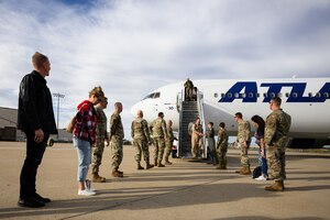 a photo of airmen deplaning