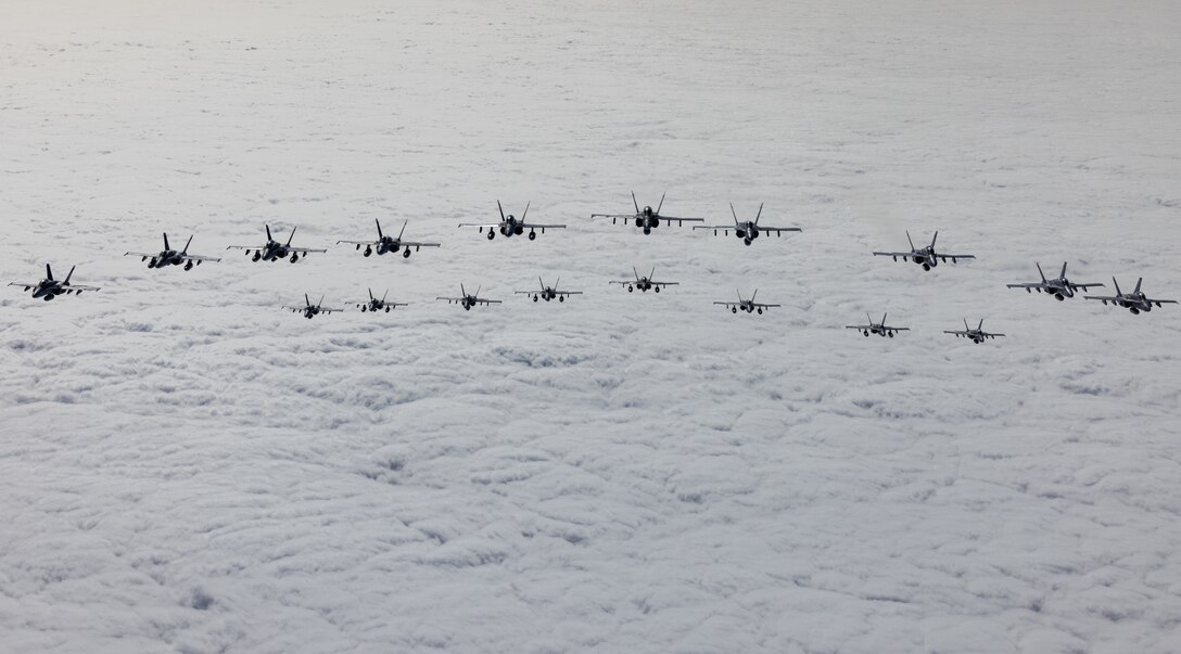 U.S. Marines with Marine Fighter Attack Training Squadron (VMFAT) 101, Marine Aircraft Group 11, 3rd Marine Aircraft Wing, conduct a mass formation launch known as “flying the barn,” to honor the squadron’s legacy on the day of its deactivation at Marine Corps Air Station Miramar, California, Sept. 29, 2023.