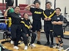 Spc. Bernice Carmona and her comrades in the gym