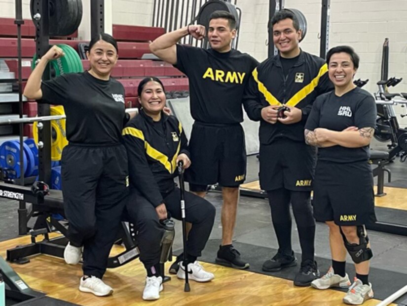 Spc. Bernice Carmona and her comrades in the gym