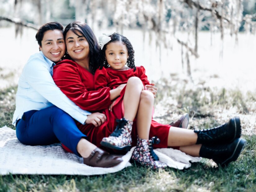 Family portrait of Spc. Bernice Carmona with her wife and daughter.