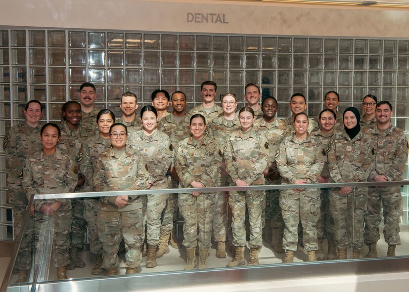 The 5th Medical Group Dental Flight poses for a group photo at Minot Air Force Base, North Dakota, March 28, 2024. The Dental Flight won the Air Force Medical Service Medium Dental Clinic of the Year award. (U.S. Air Force photo by Senior Airman Evan Lichtenhan)
