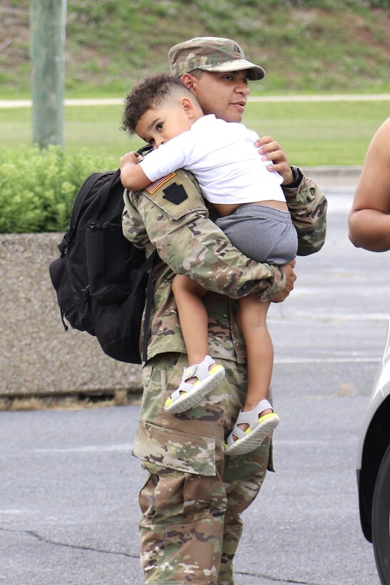 U.S. Soldiers with the 1069th Military Police Company, 55th Maneuver Enhancement Brigade arrive home and reunite with loved ones July 1, 2022, after a year-long deployment to Cuba. The Soldiers were also greeted at Harrisburg International Aiport by Brig. Gen. Laura McHugh, Pennsylvania Deputy Adjutant General-Army, and other senior leaders with the Pennsylvania National Guard.